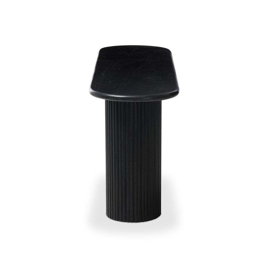 Maison Olive Table d'appoint ovale en marbre noir veiné avec pied cylindrique cannelé noir.