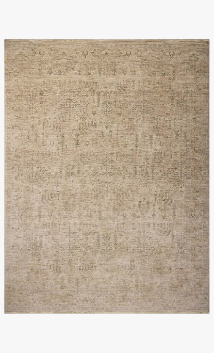 Tapis Maison Olive Junie couleur avoine et fumée, motif antique tissé en polyester, style moderne et sophistiqué.