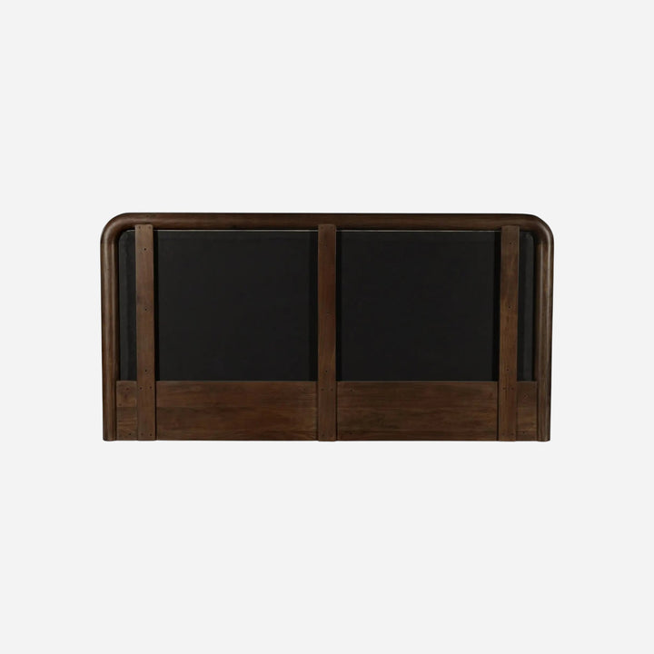 Vue arrière de la tête de lit Maison Olive en bois massif sombre avec structure incurvée et finitions artisanales