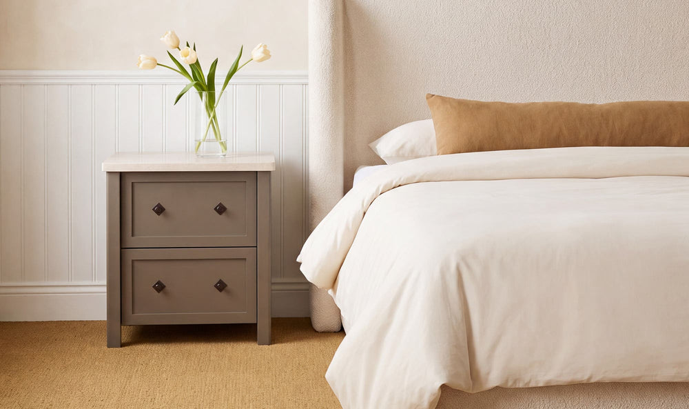 MATILDA dark olive nightstand, in a bedroom beside a bed